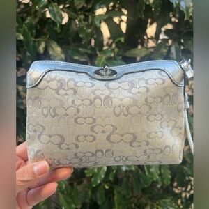 Coach metallic silver and white lurex with turnlock wristlet